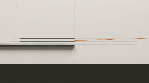 Two lines on a drafting table. Left: dark ink, ruled with a straightedge, ending cleanly. Right: survey-marker orange, drawn freehand, continuing past the frame.