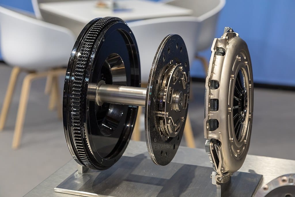 Exploded view of a flywheel, friction disk, and clutch kit. Matti Blume, CC BY-SA 4.0, via Wikimedia Commons
