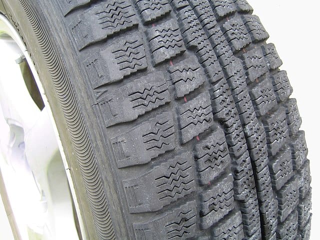 A winter tire. Lombroso, Public domain, via Wikimedia Commons