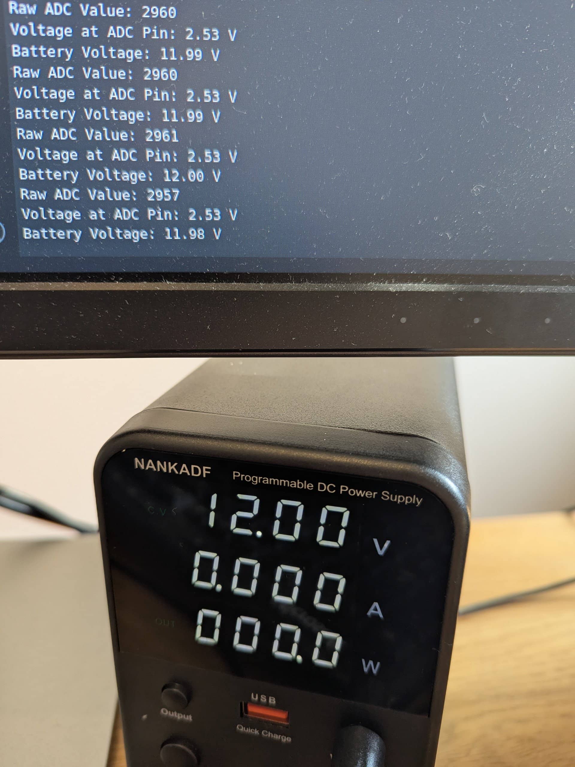 The adjustable power supply provides a steady 12 V, and measurements come in around 11.98 -12 V.