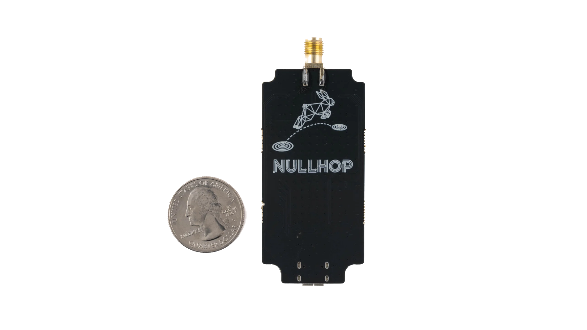 The back of the MeshToad V3 featuring a NullHop logo with a geometric rabbit hopping from one circular spot to another. A quarter is next to the board for scale.