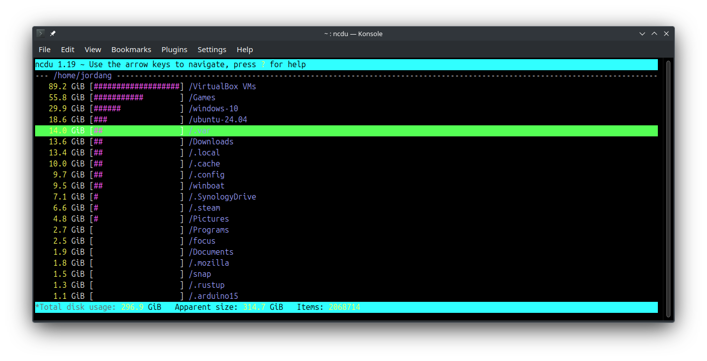 The ncdu app in a terminal window being used to view large files in the home directory.