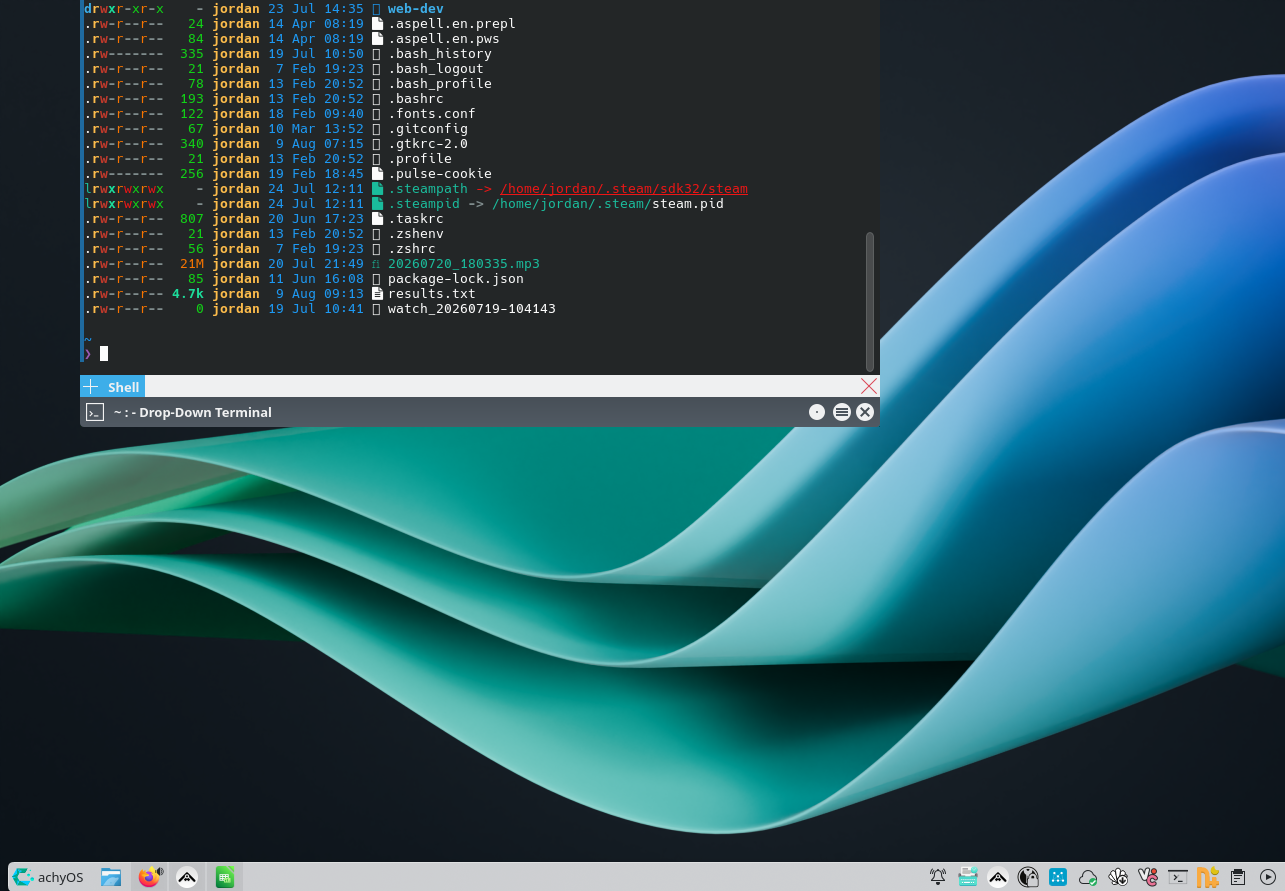 A KDE Plasma desktop with a Yakuake drop-down terminal in the top-left corner of the screen.
