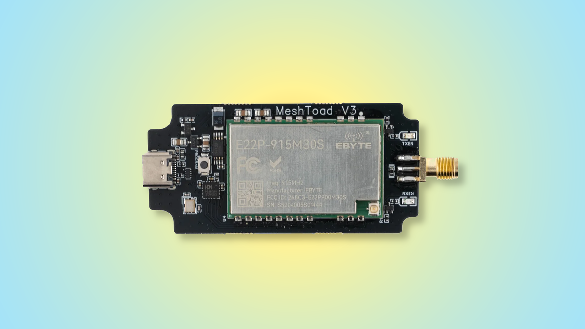 A top view of the MeshToad V3 radio module on a yellow-to-blue gradient background.