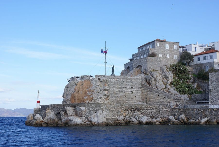 Hydra harbour and the town rising behind it