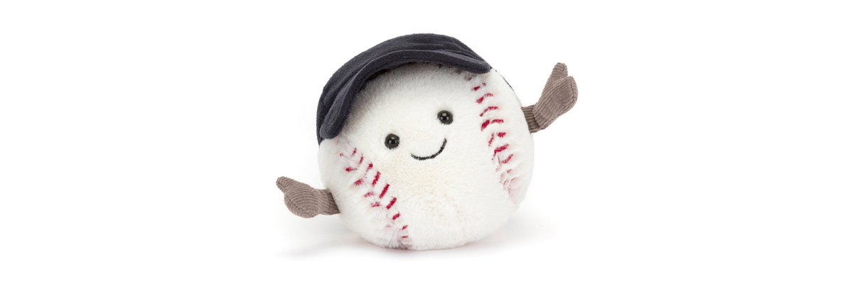 A low-res (sorry) image of the Jellycat baseball plushy: a slightly anthropomorphized baseball with a big grin, black cap, and arms flung wide as if to offer a hug or a hello.