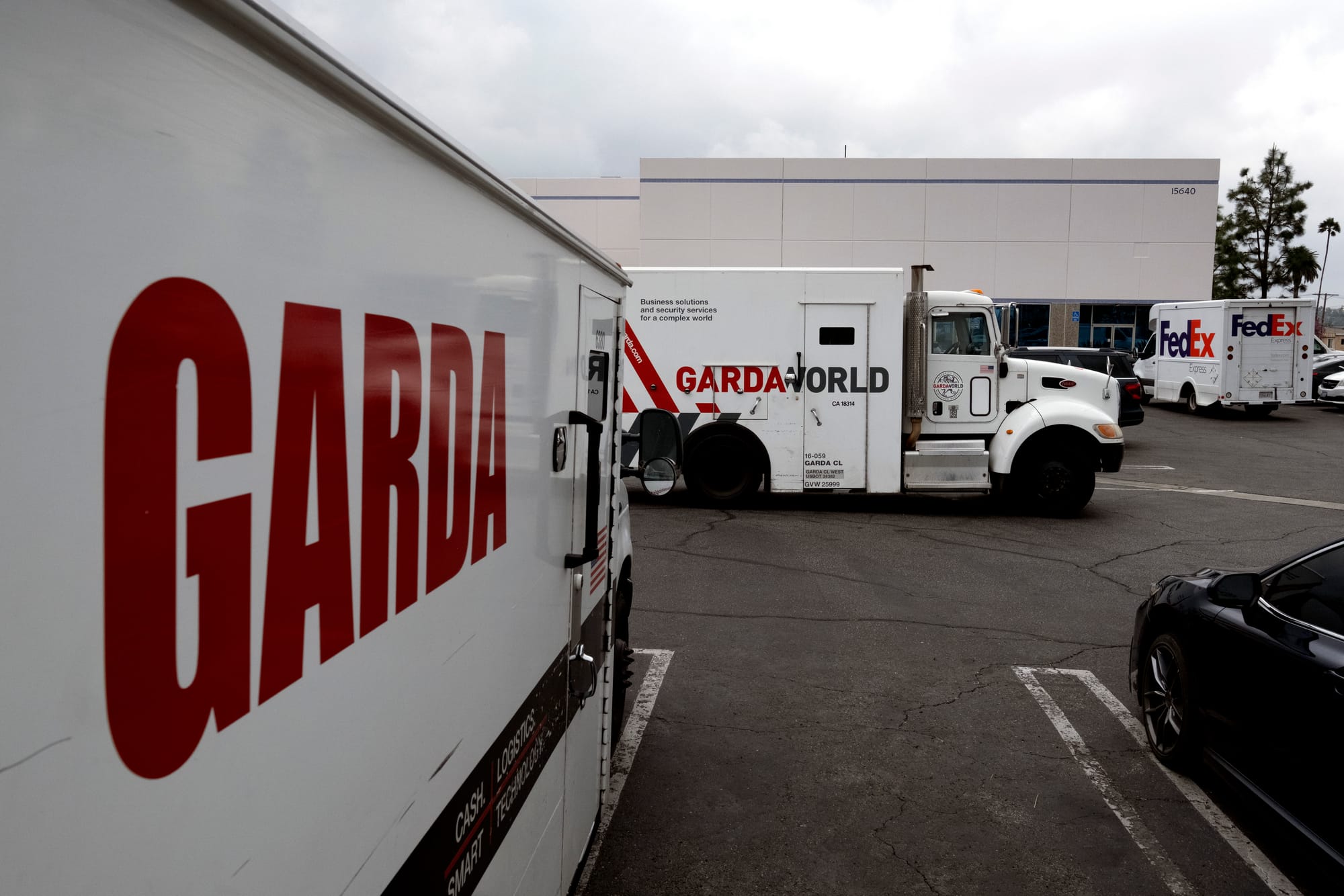 GardaWorld trucks are pictured in a parking lot