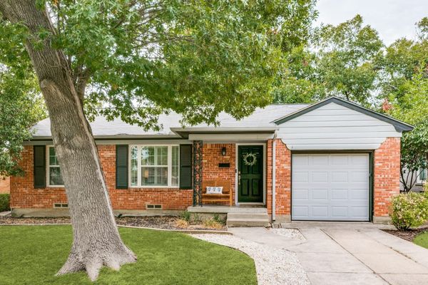 Exterior of 6126 Saint Moritz, a home in the Caruth Terrace neighborhood of Dallas, Texas, known for its tree-lined streets and midcentury architecture.