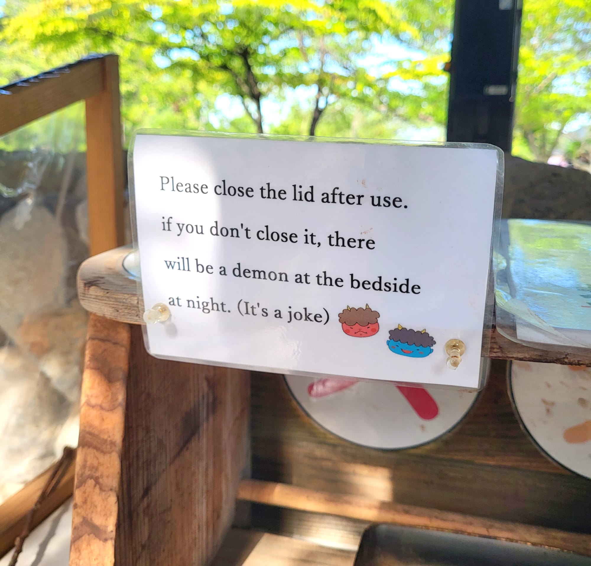 a funny sign found in Beppu, Japan, saying that the lid of the stamp pad should be closed