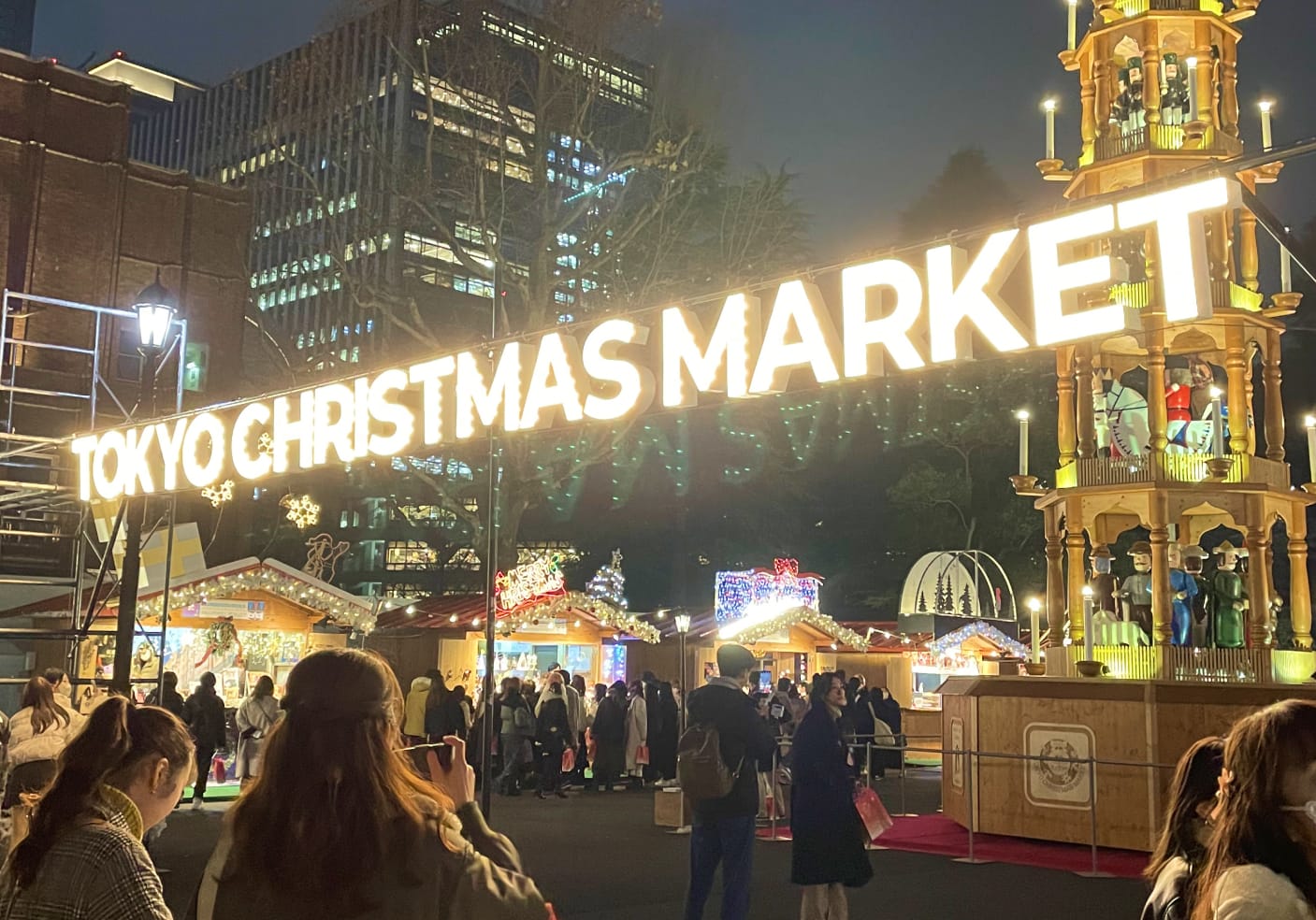 Brightly light Tokyo Christmas Market Entrance with a large Christmas pyramid
