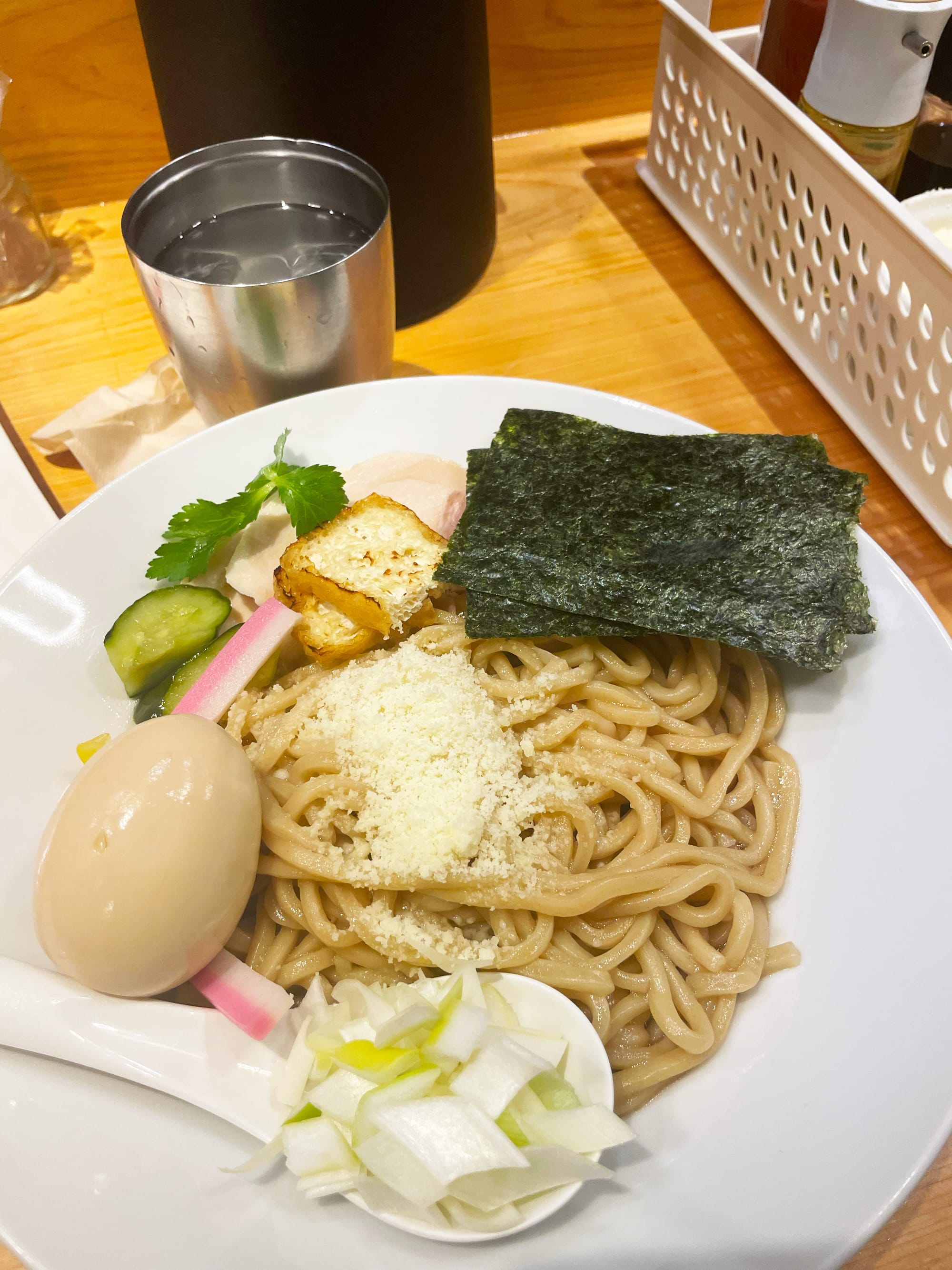 The maze soba at Mugi to Olive, Ginza. Bowl of ramen with seaweed, scallions, and egg.
