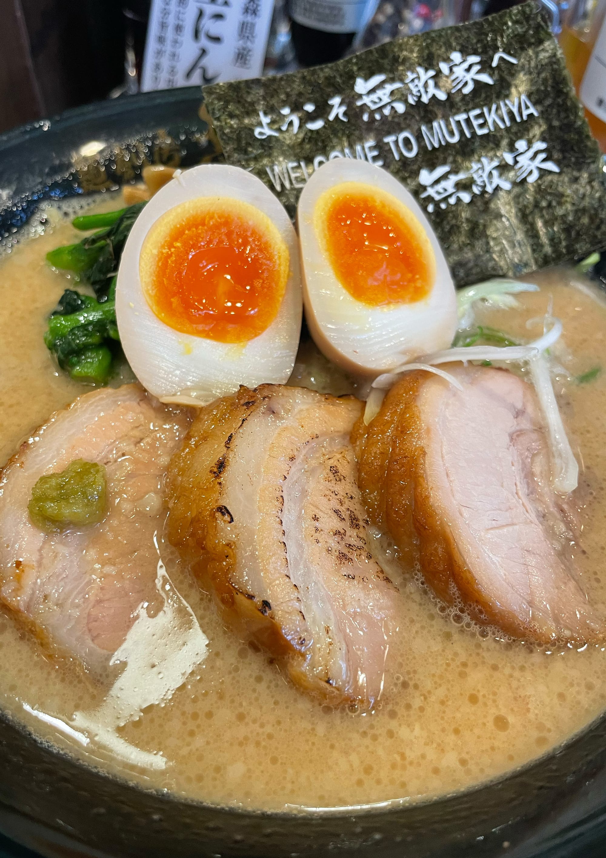 Mutekiya's chashu soup ramen. Bowl of ramen with chashu meat and egg.