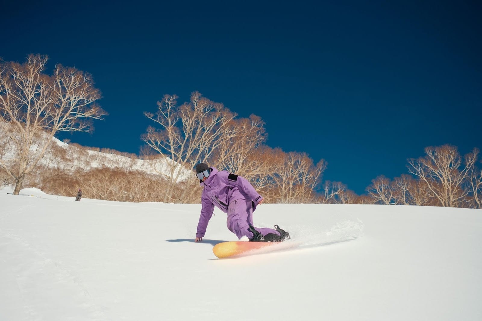 Dynamic Snowboarding Scene in Hakuba, Japan