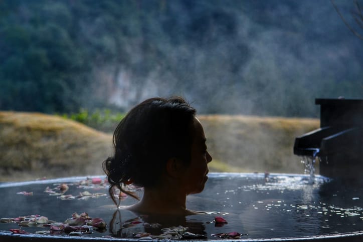 A women enjoying the onsen in Japan.