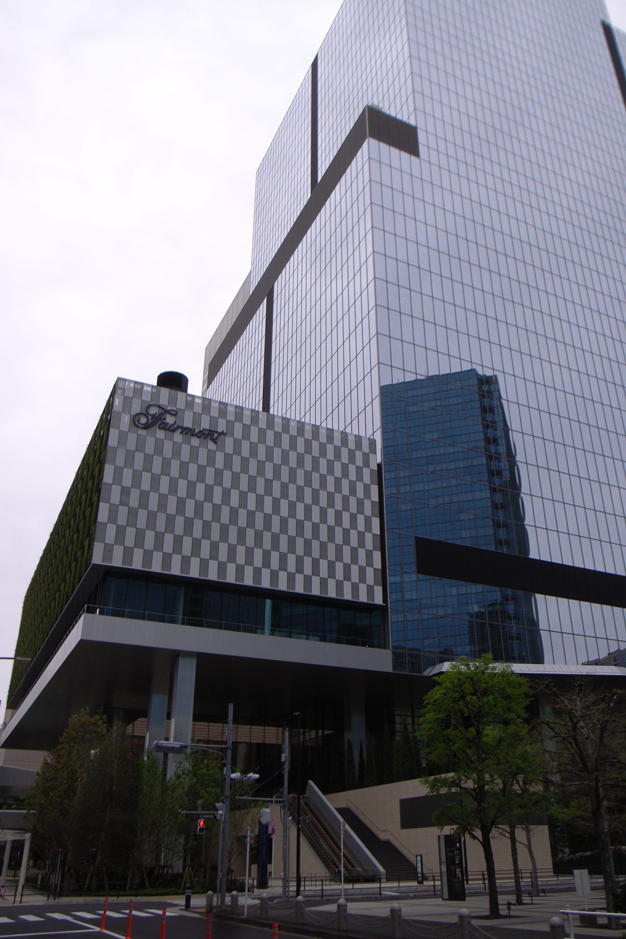 Blue Front Shibaura under construction, with reflective glass and checkered facade.