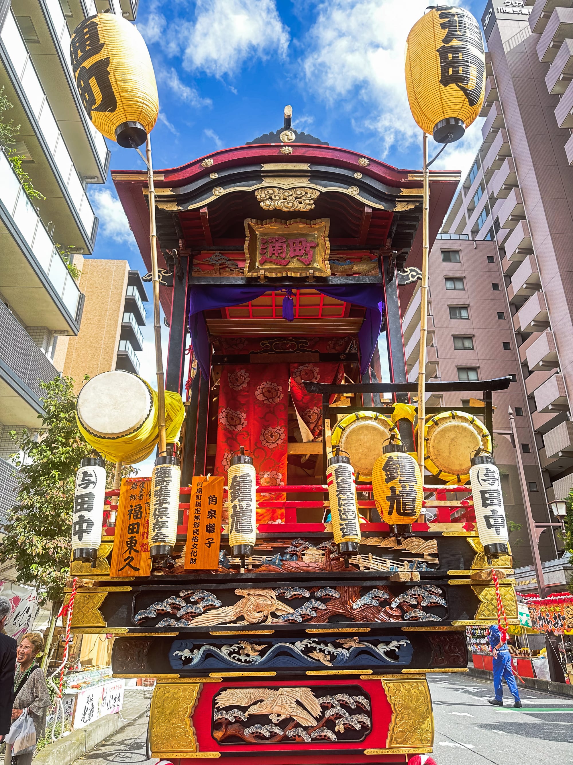 The sky and the float at Kawagoe Festival, with lanterns and decorative patterns on the front.