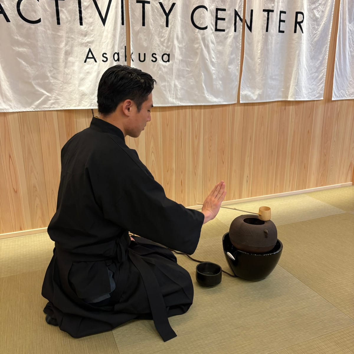 Japanese tea master performing tea ceremony at BubActivity in Asakusa Tokyo