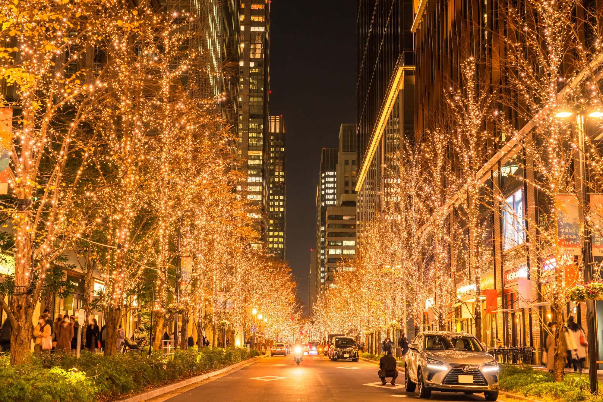 Marunouchi street illuminated with bright and warm LED lights for the festive season.