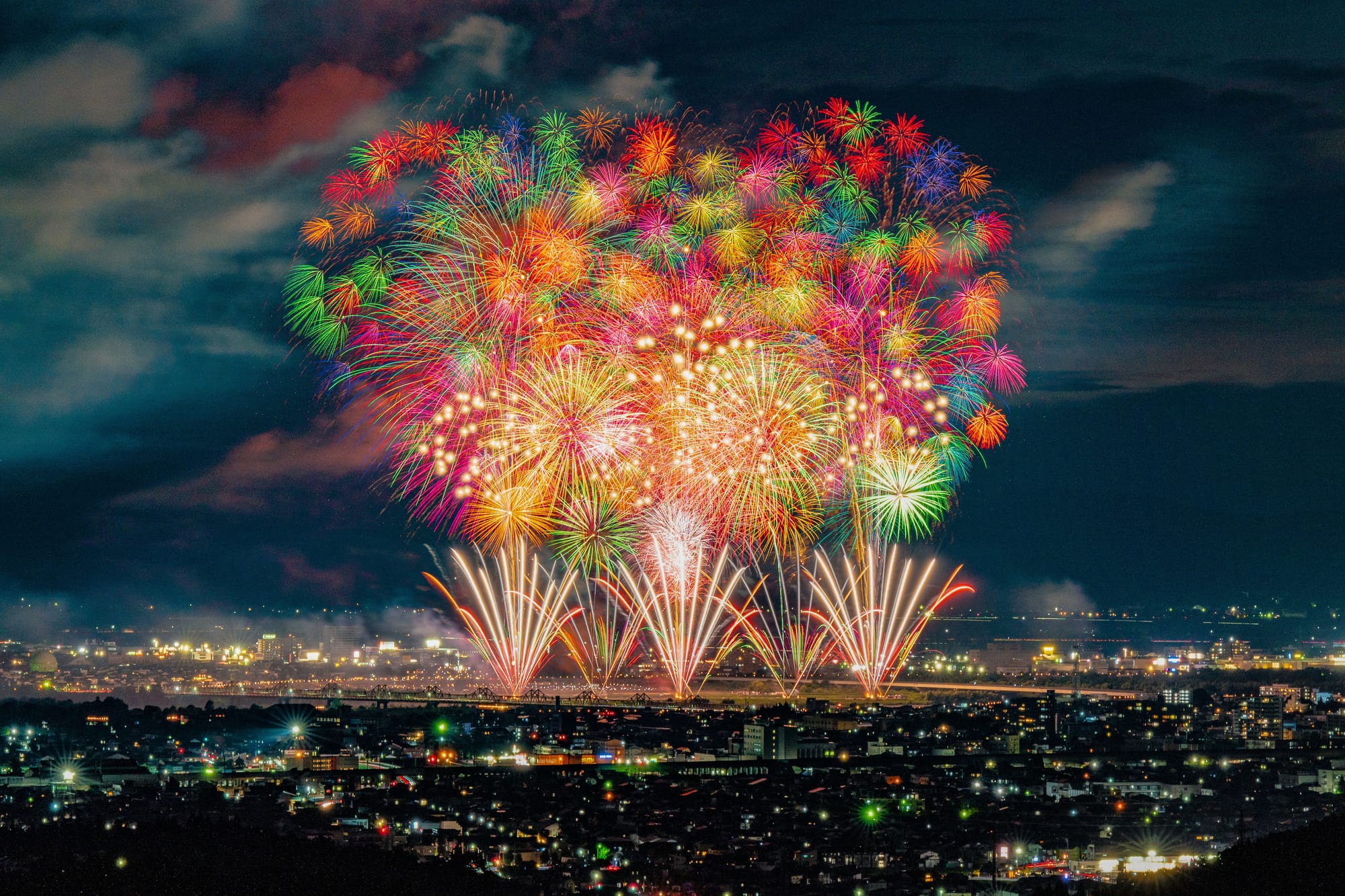 A large display of multi-colored fireworks in Nagaoka city, Japan