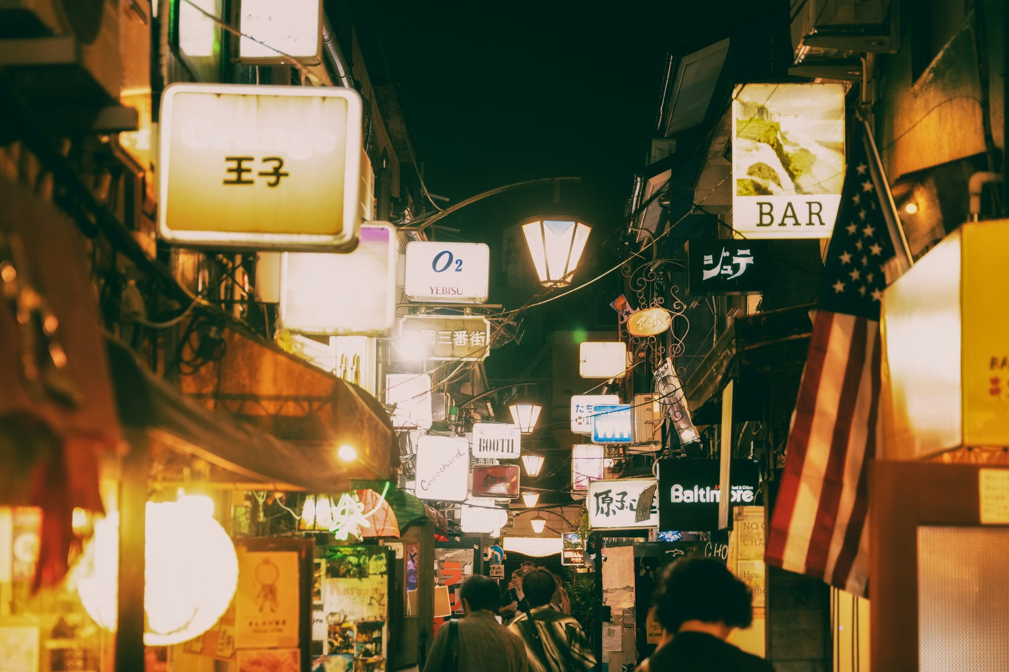 An alleyway in Tokyo filled with bars