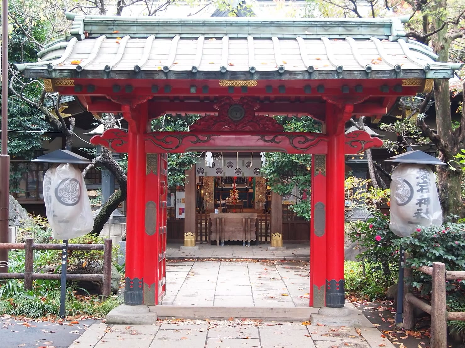 The entrance red door of a traditional shrine in Tokyo, Japan