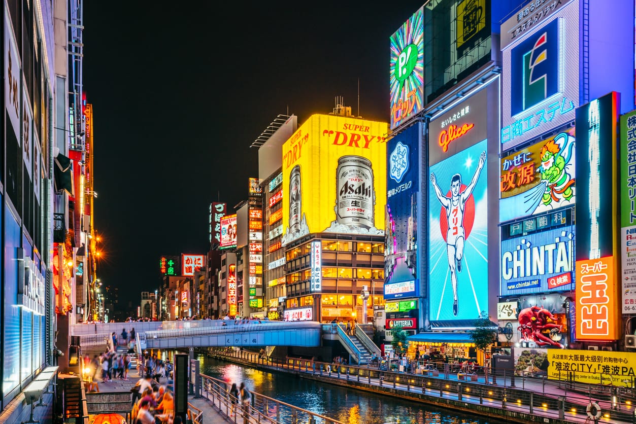 Osaka's Dotonbori area at night with the Glico sign in the background