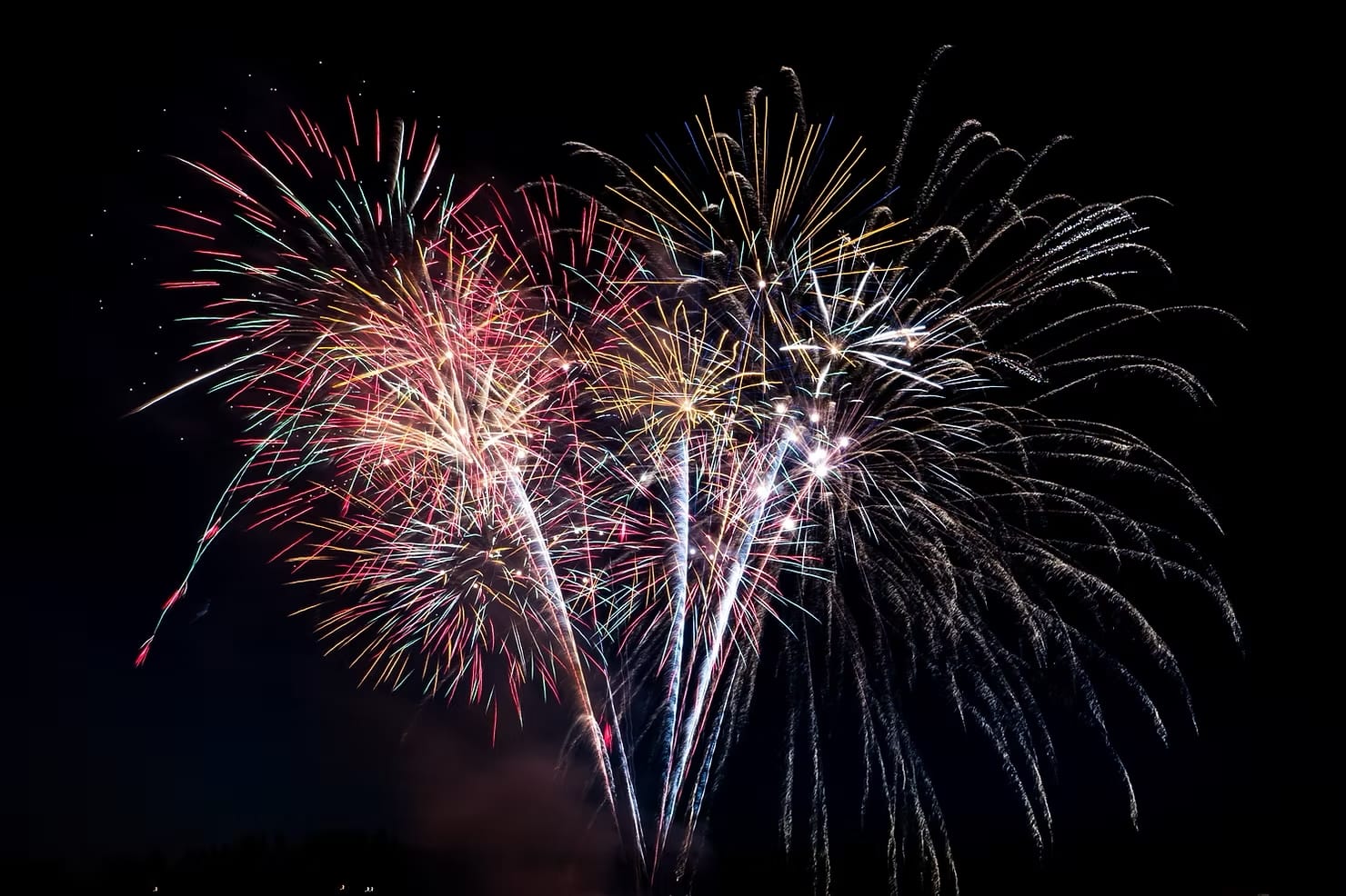 An impressive and colorful fireworks display in Tokyo, Japan, at night during summer