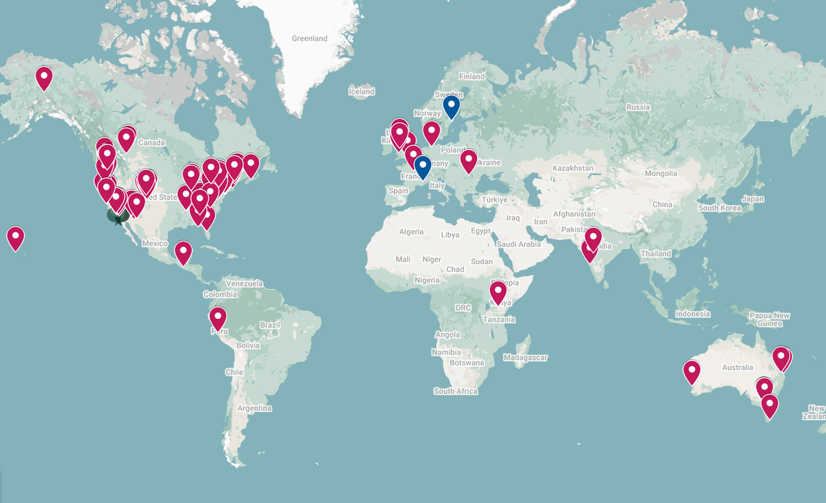 Map of the world featuring red and blue pins. Each pin represents a conversation with a guest.