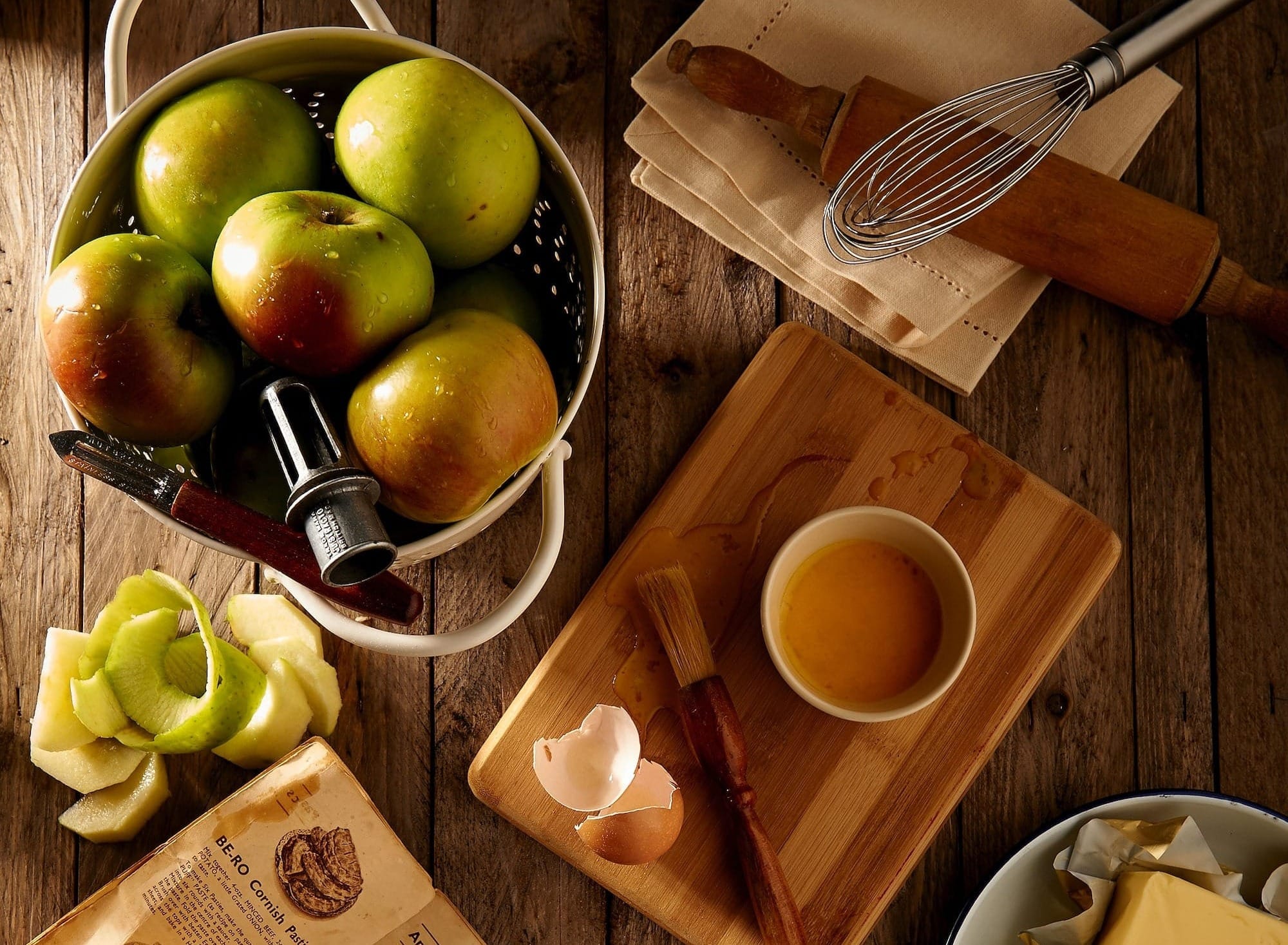 flat lay photography of mug on brown wooden chopping board