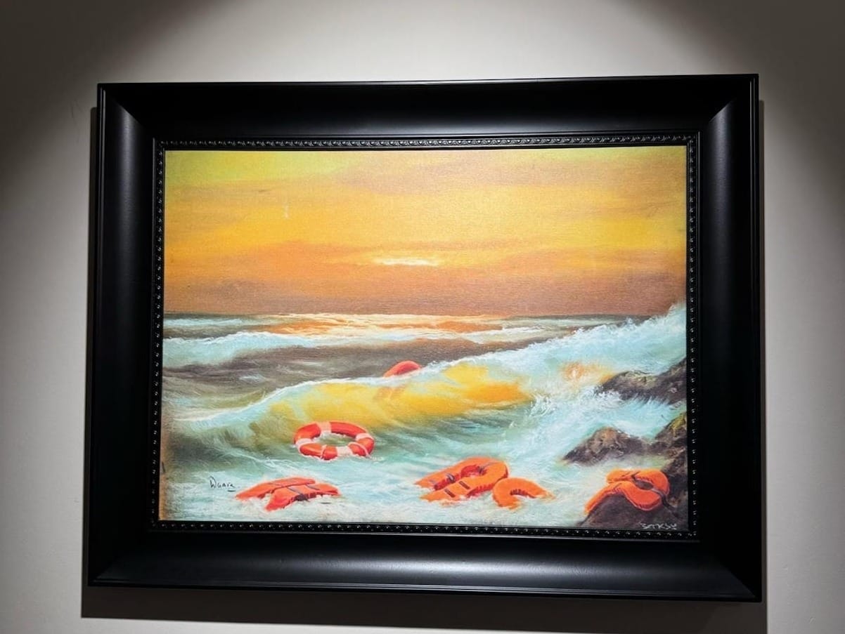 A framed picture of a beach

AI-generated content may be incorrect.