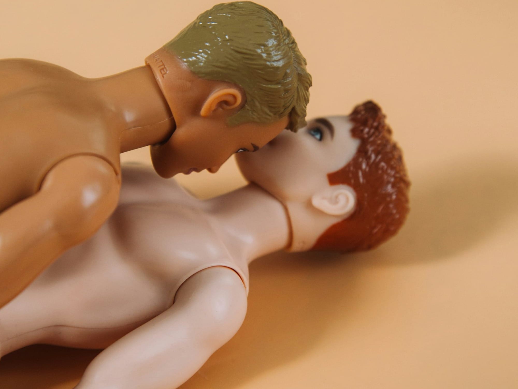 topless woman with white hair figurine