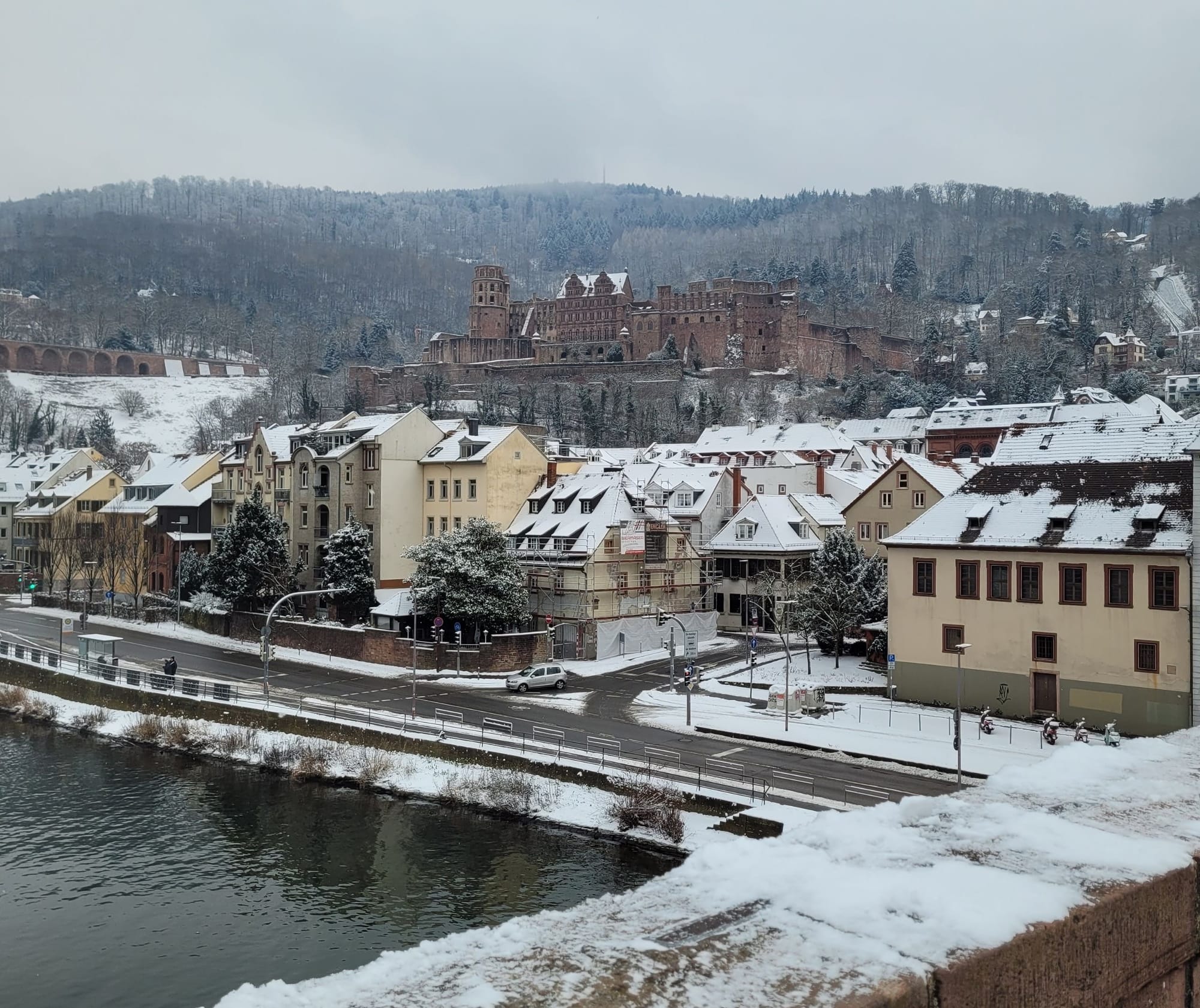Heidelberg Castle and some of the rest of the city with snow-covered roofs