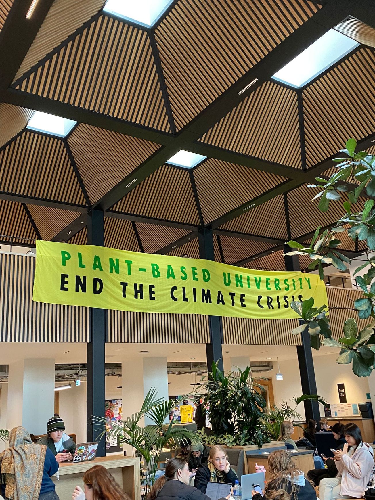 Plant Based Universities drop banner over Senate House balcony in support of AMM motion