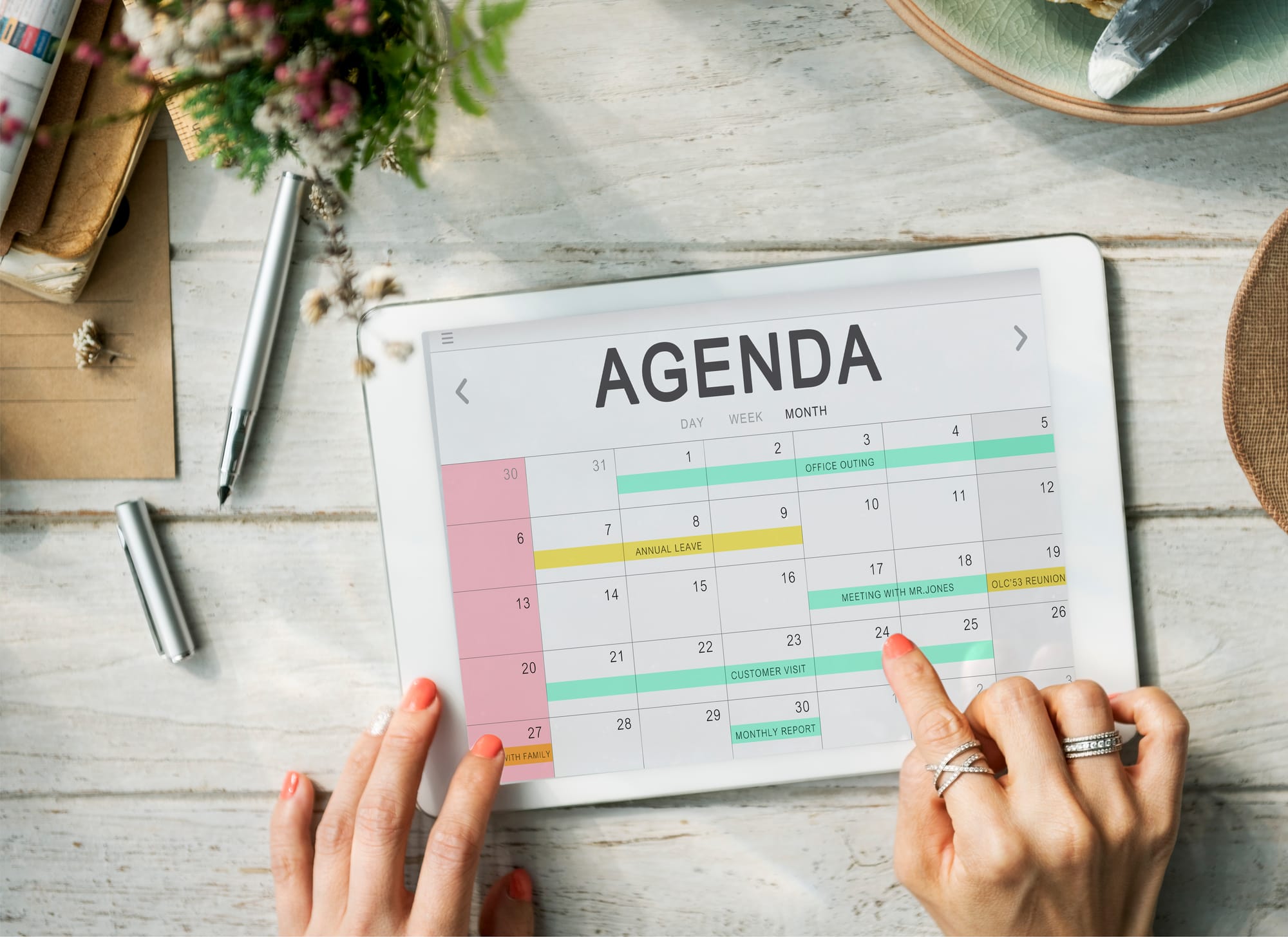Na imagem: agenda online em um tablet