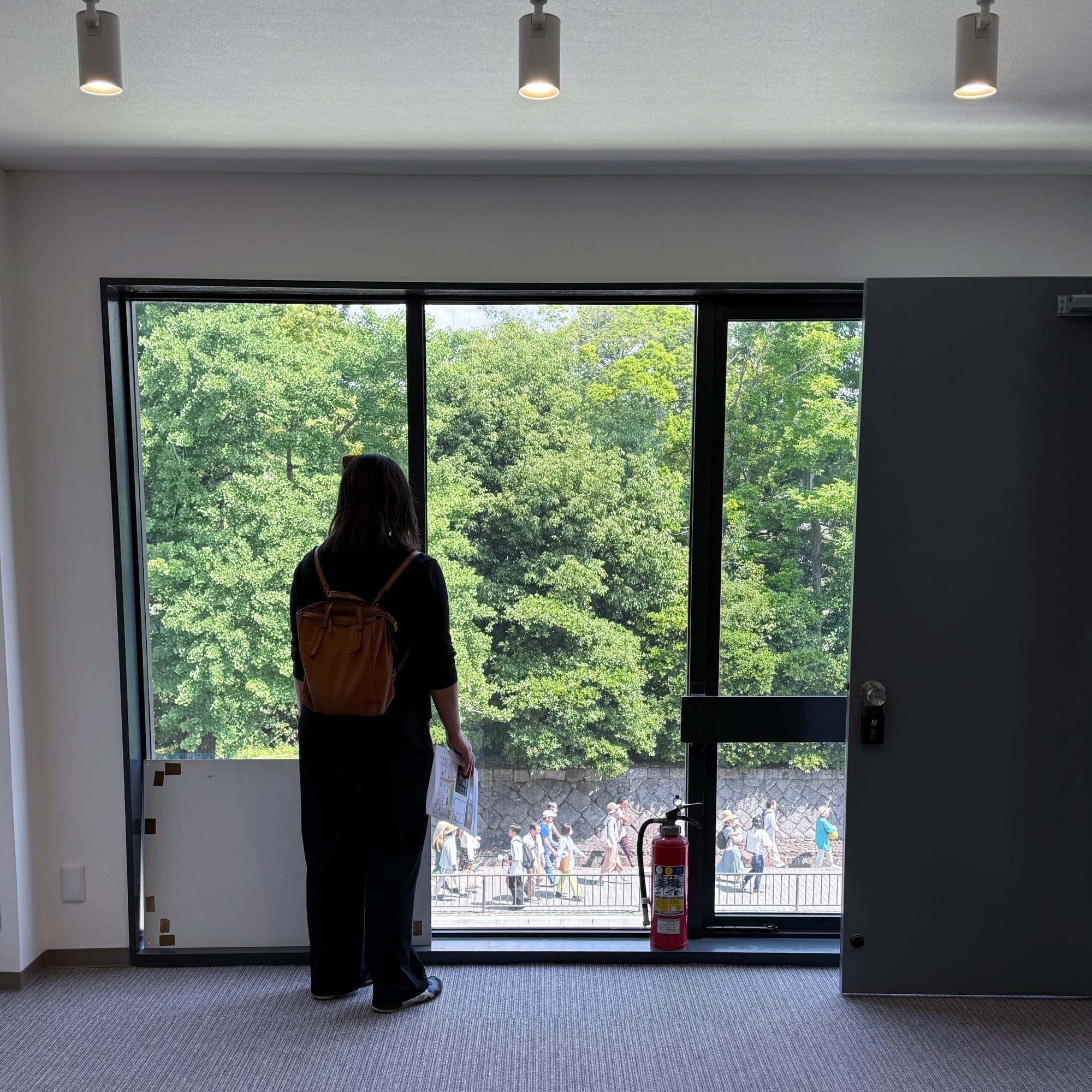 Ryoko looking out the window of a possible future HanaYou space in Kyoto