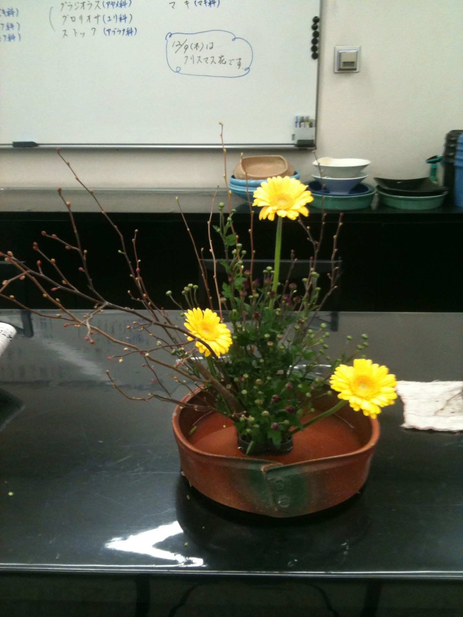 Early ikebana arrangement in an Osaka classroom in December 2010