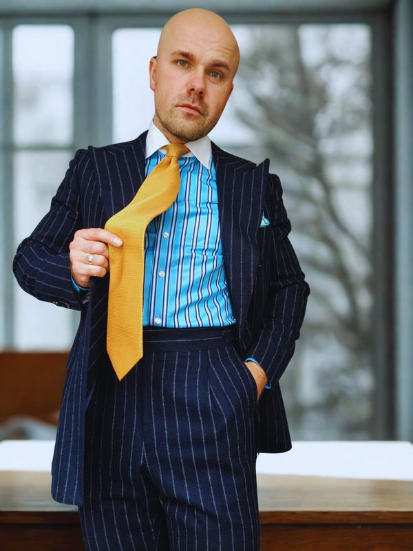 The Gentleman as a Weapon: Precision, Power, and Pinstripes