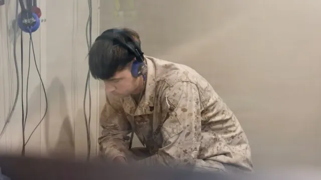 Sleeping Marine aces hearing test