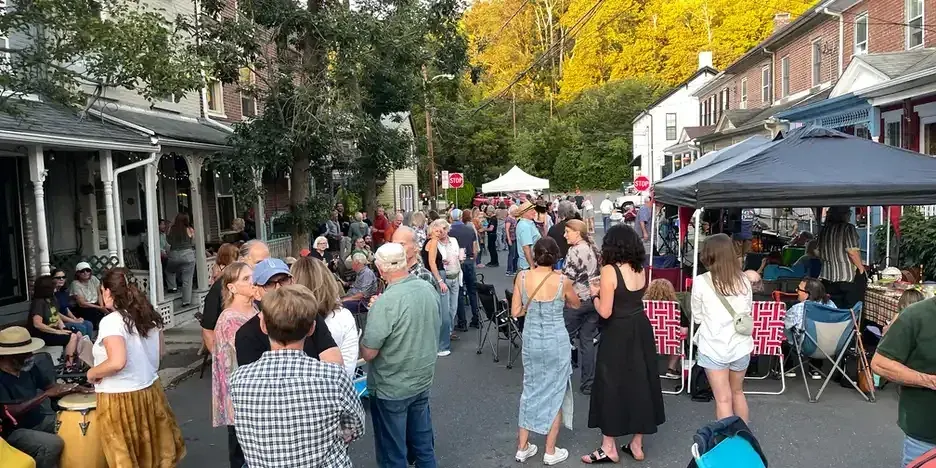 people gathered on the street and talking