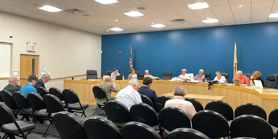 the planning board listening to an applicant speak