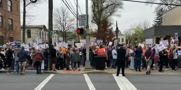 people marching with signs