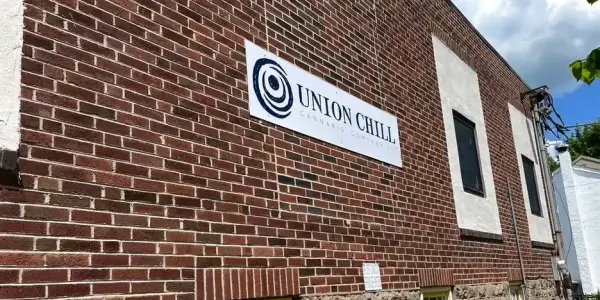 a brick facade with a sign on it that reads, "Union Chill"