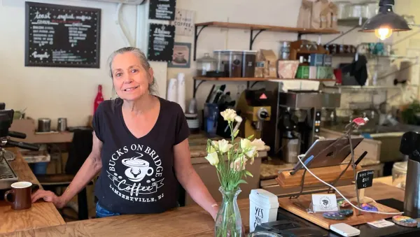 Babs Simon standing at the counter in her coffee shop