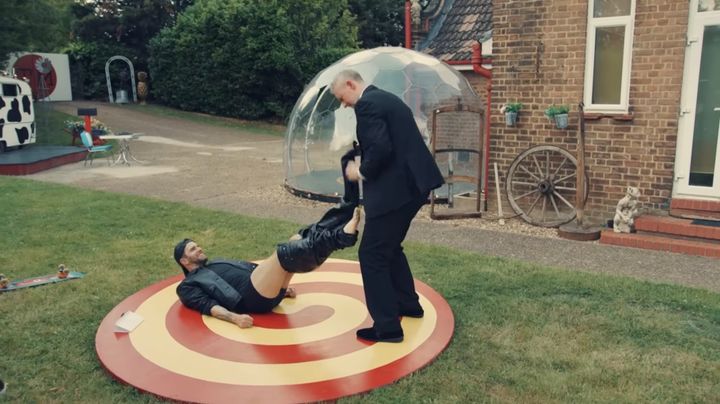 Little Alex Horne removes Joel Dommett’s leather pants.