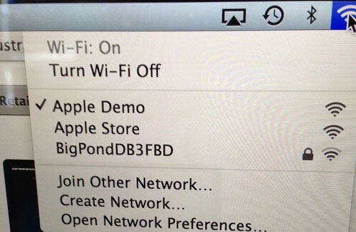 A MacBook Pro connected to "Apple Demo"