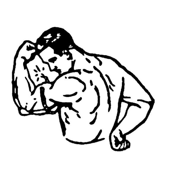 Black and white photo of a man flexing.