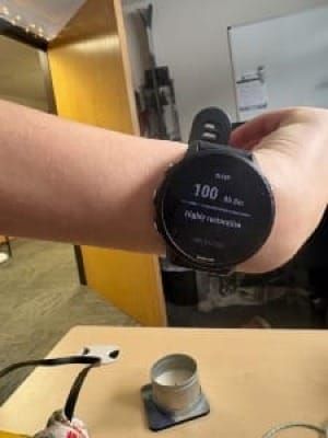 Picture of watch face showing 100 sleep score. 