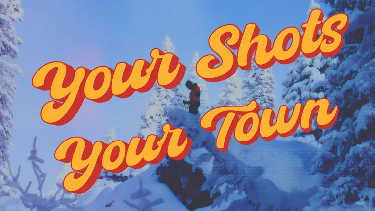 Picture of skier looking over a cliff jump deciding if he should do it. 