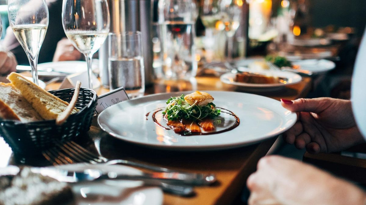 Restaurant table with fresh coastal dining dishes