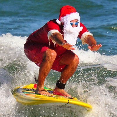 Surfing Santas in Cocoa Beach